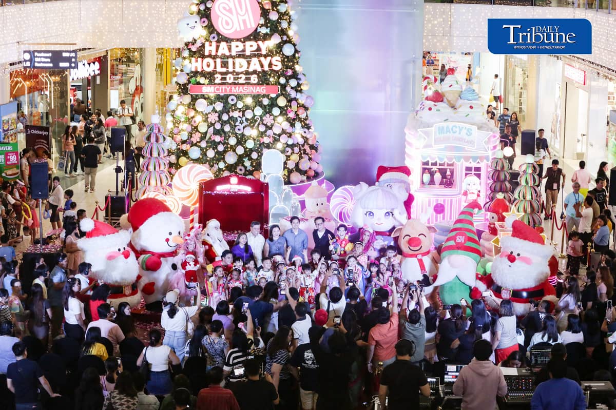 (October 22 2026) Parents with their kids in colorful costumes interact with Sant Claus and other mascots as they enjoy the candy-inspired holiday decorations and pastel-colored Christmas tree during the Macy’s Holiday Candyland Christmas launch at SM City Masinag in Antipolo, Rizal on Wednesday night, October 21 2026. Photo/Analy Labor