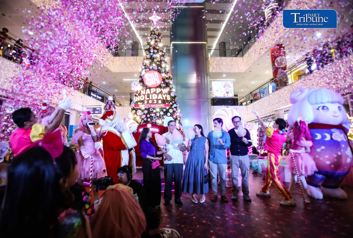 (October 22 2026) Parents with their kids in colorful costumes interact with Sant Claus and other mascots as they enjoy the candy-inspired holiday decorations and pastel-colored Christmas tree during the Macy’s Holiday Candyland Christmas launch at SM City Masinag in Antipolo, Rizal on Wednesday night, October 21 2026. Photo/Analy Labor