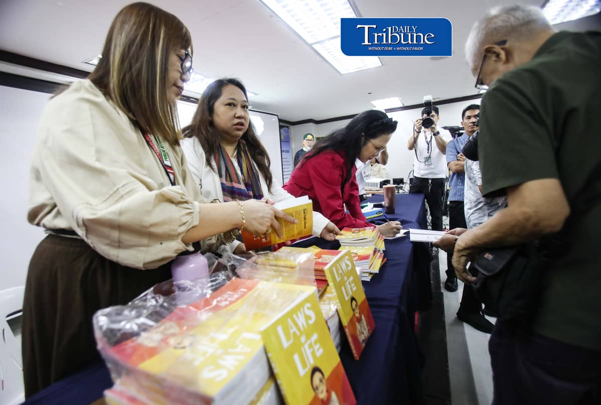 (October 22 2026) Members of the Media queue for the autograph of Public Attorney’s Office Chief Persida Rueda-Acosta, as PAO Chief give her book “Laws of Life” for free, and they also avail the free check up and medicine, during a medical mission at the PAO Main Office at the DOJ Agencies Building in Quezon City as part of their 54th anniversary celebration, providing free legal assistance and counsel to indigent litigants across the country. Photo/Analy Labor