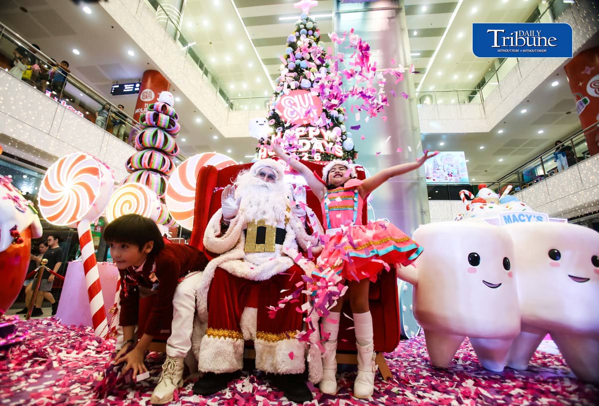 (October 22 2026) Parents with their kids in colorful costumes interact with Sant Claus and other mascots as they enjoy the candy-inspired holiday decorations and pastel-colored Christmas tree during the Macy’s Holiday Candyland Christmas launch at SM City Masinag in Antipolo, Rizal on Wednesday night, October 21 2026. Photo/Analy Labor