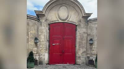 THE bright red double doors of the historic Ancien Couvent de la Merci.