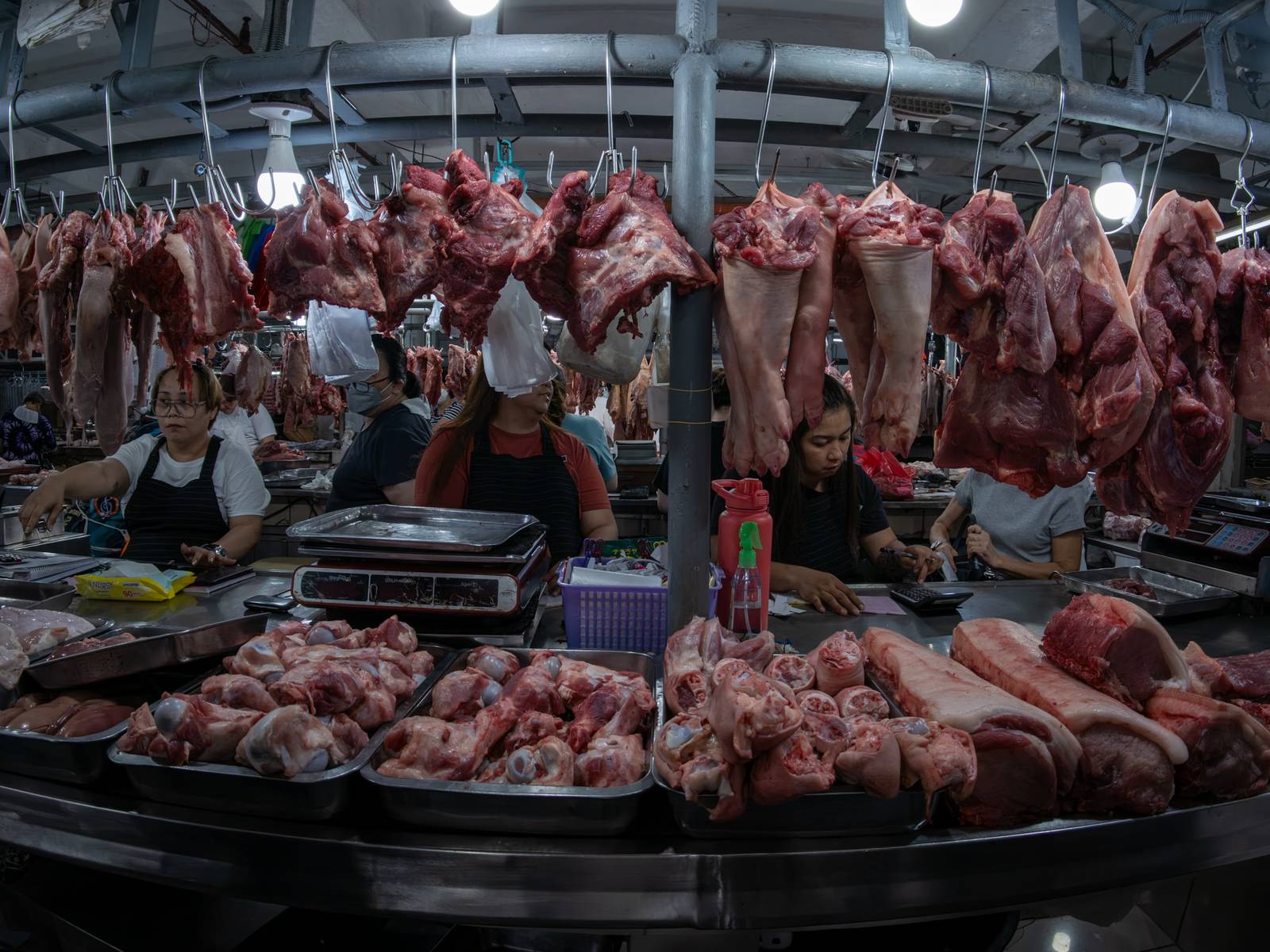 Pork cuts are displayed at a meat section of a public market in Manila on 22 October 2026. Local hog raisers nationwide have launched a three-day “pork holiday” from 22 to 24 October, voluntarily suspending live hog deliveries to markets to protest mounting industry losses, rising production costs and competition from imported pork. The protest aims to urge the government to review import policies and strengthen protection for the domestic hog industry.