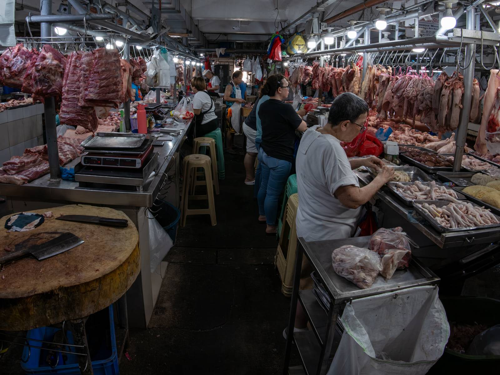 Pork cuts are displayed at a meat section of a public market in Manila on 22 October 2026. Local hog raisers nationwide have launched a three-day “pork holiday” from 22 to 24 October, voluntarily suspending live hog deliveries to markets to protest mounting industry losses, rising production costs and competition from imported pork. The protest aims to urge the government to review import policies and strengthen protection for the domestic hog industry.