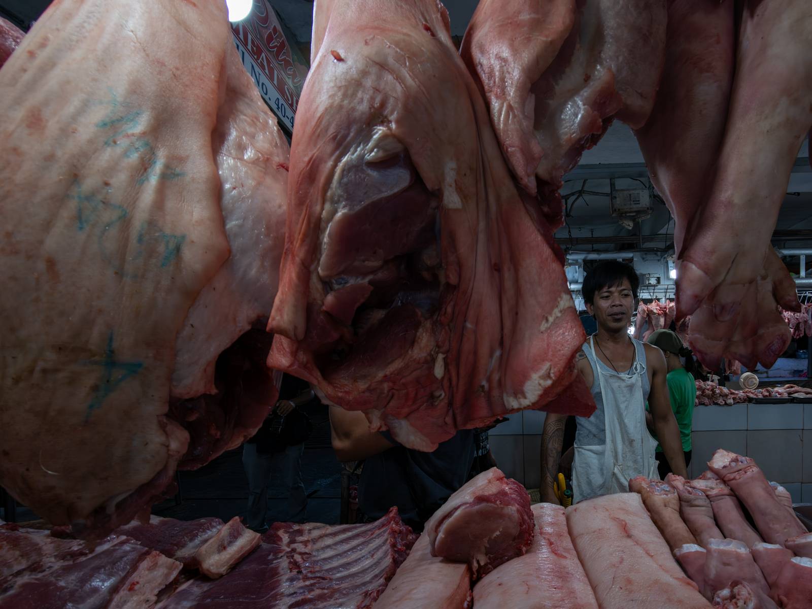 Pork cuts are displayed at a meat section of a public market in Manila on 22 October 2026. Local hog raisers nationwide have launched a three-day “pork holiday” from 22 to 24 October, voluntarily suspending live hog deliveries to markets to protest mounting industry losses, rising production costs and competition from imported pork. The protest aims to urge the government to review import policies and strengthen protection for the domestic hog industry.