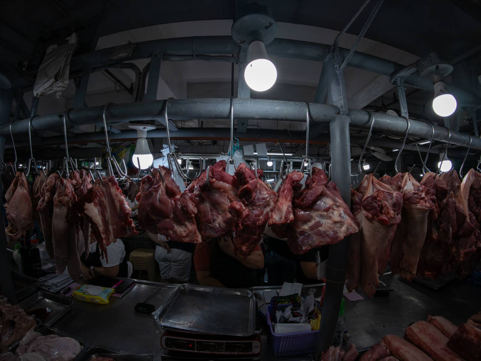 Pork cuts are displayed at a meat section of a public market in Manila on 22 October 2026. Local hog raisers nationwide have launched a three-day “pork holiday” from 22 to 24 October, voluntarily suspending live hog deliveries to markets to protest mounting industry losses, rising production costs and competition from imported pork. The protest aims to urge the government to review import policies and strengthen protection for the domestic hog industry.