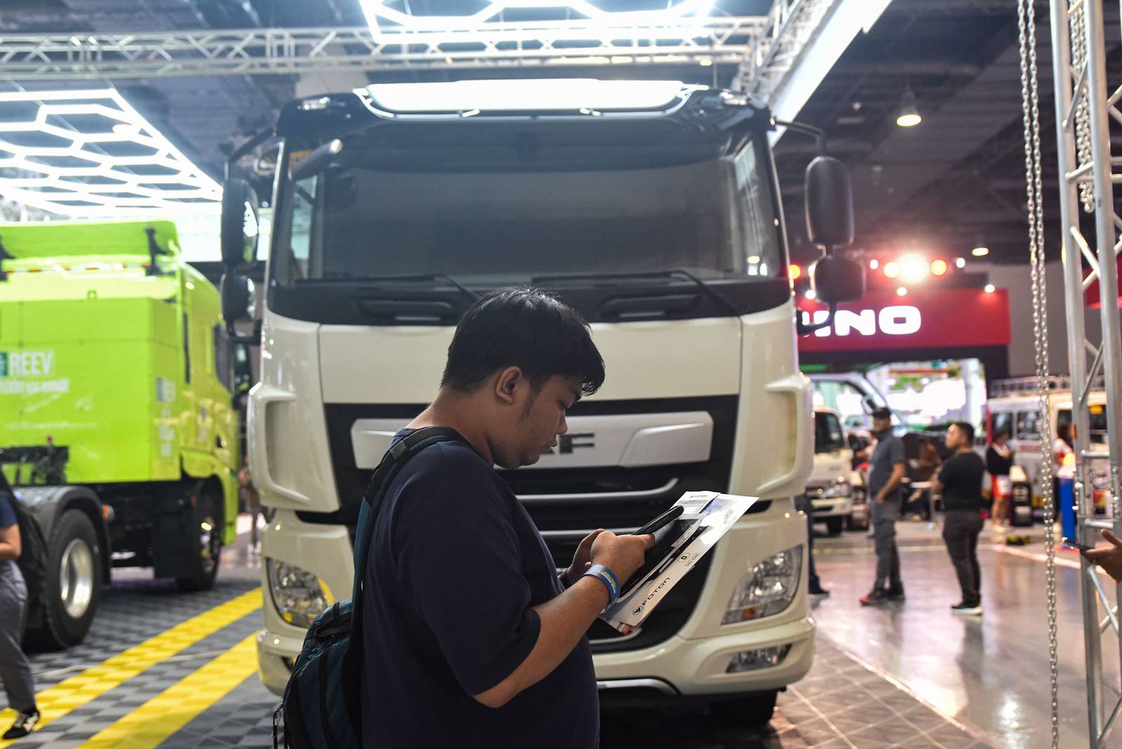 Truck enthusiasts and industry representatives explore commercial vehicles and automotive innovations during the inaugural Philippine International Truck Show (PITS) at the SMX Convention Center in Pasay City on October 23. 

The three-day event, organized by the Truck Manufacturers Association, Inc. (TMA) and the Automotive Body Manufacturers Association of the Philippines, Inc. (ABMAP), showcases trucks and transport solutions for cargo delivery, public transport, construction, and other commercial uses. l Zedrich Xylak Madrid