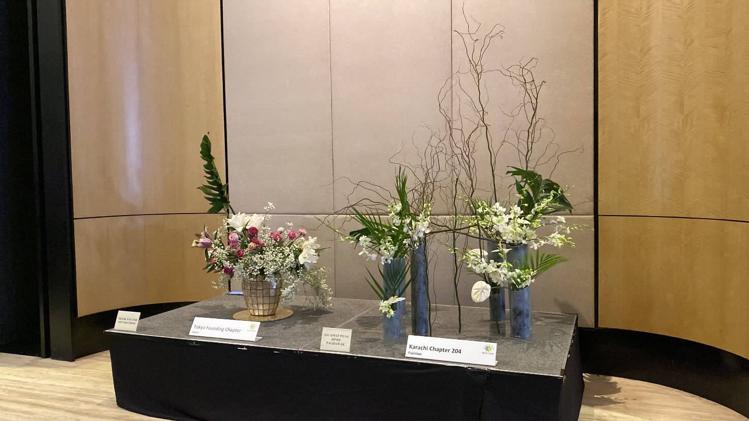 IKEBANA arrangements displayed by the Tokyo Founding Chapter of Japan and the Karachi Chapter of Pakistan.