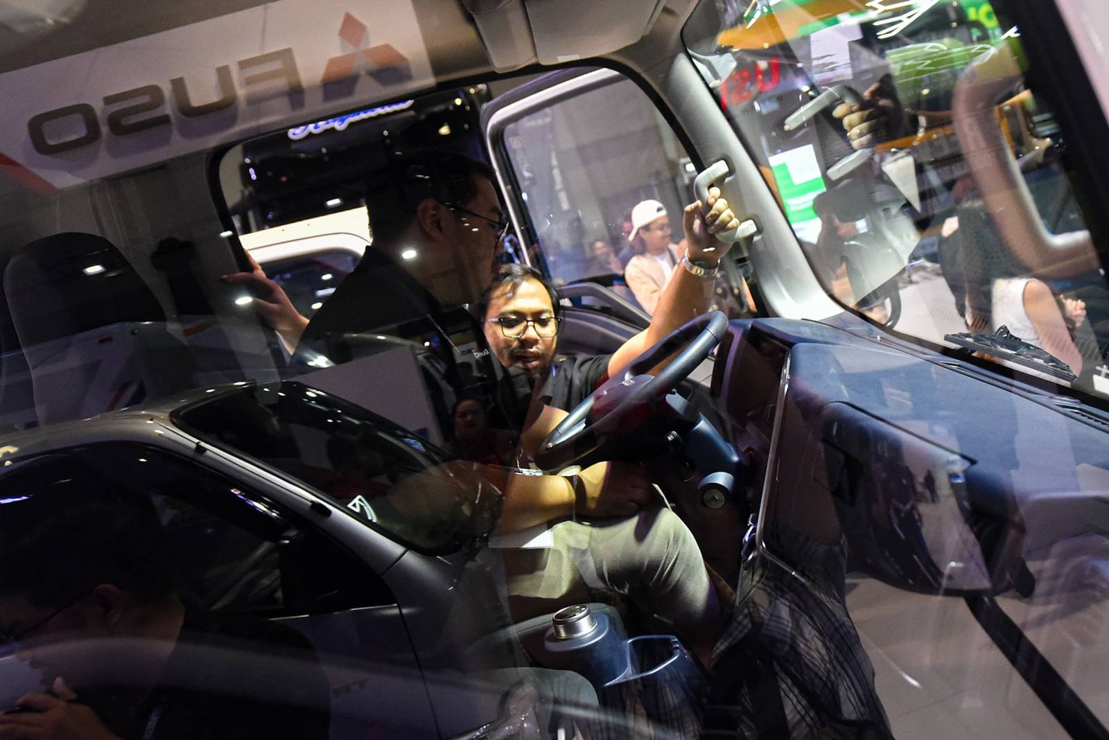 Truck enthusiasts and industry representatives explore commercial vehicles and automotive innovations during the inaugural Philippine International Truck Show (PITS) at the SMX Convention Center in Pasay City on October 23. 

The three-day event, organized by the Truck Manufacturers Association, Inc. (TMA) and the Automotive Body Manufacturers Association of the Philippines, Inc. (ABMAP), showcases trucks and transport solutions for cargo delivery, public transport, construction, and other commercial uses. l Zedrich Xylak Madrid