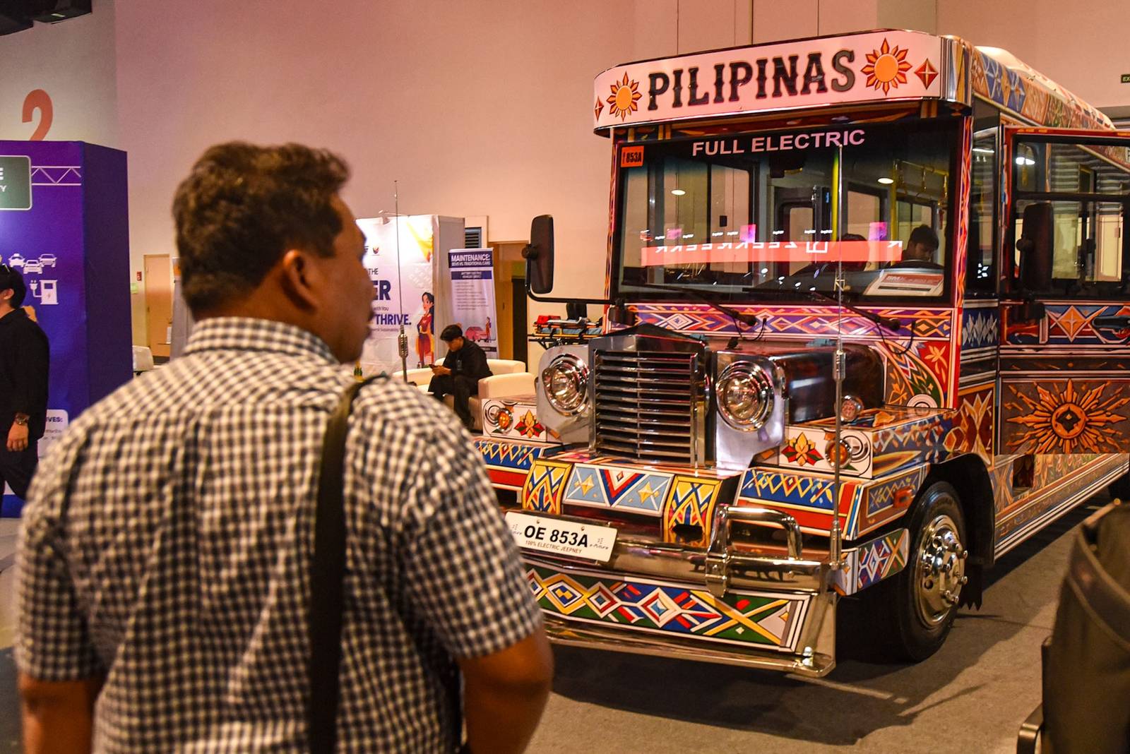 Car enthusiasts visit the 14th Philippine Electric Vehicle Summit (PEVS) 2026 to explore the latest electric vehicle models along with chargrs at the SMX Convention Center in Pasay City on October 23. 

The three-day summit runs from October 22 to 24, showcasing emerging technologies and alternatives to conventional fuel-powered vehicles. l Zedrich Xylak Madrid