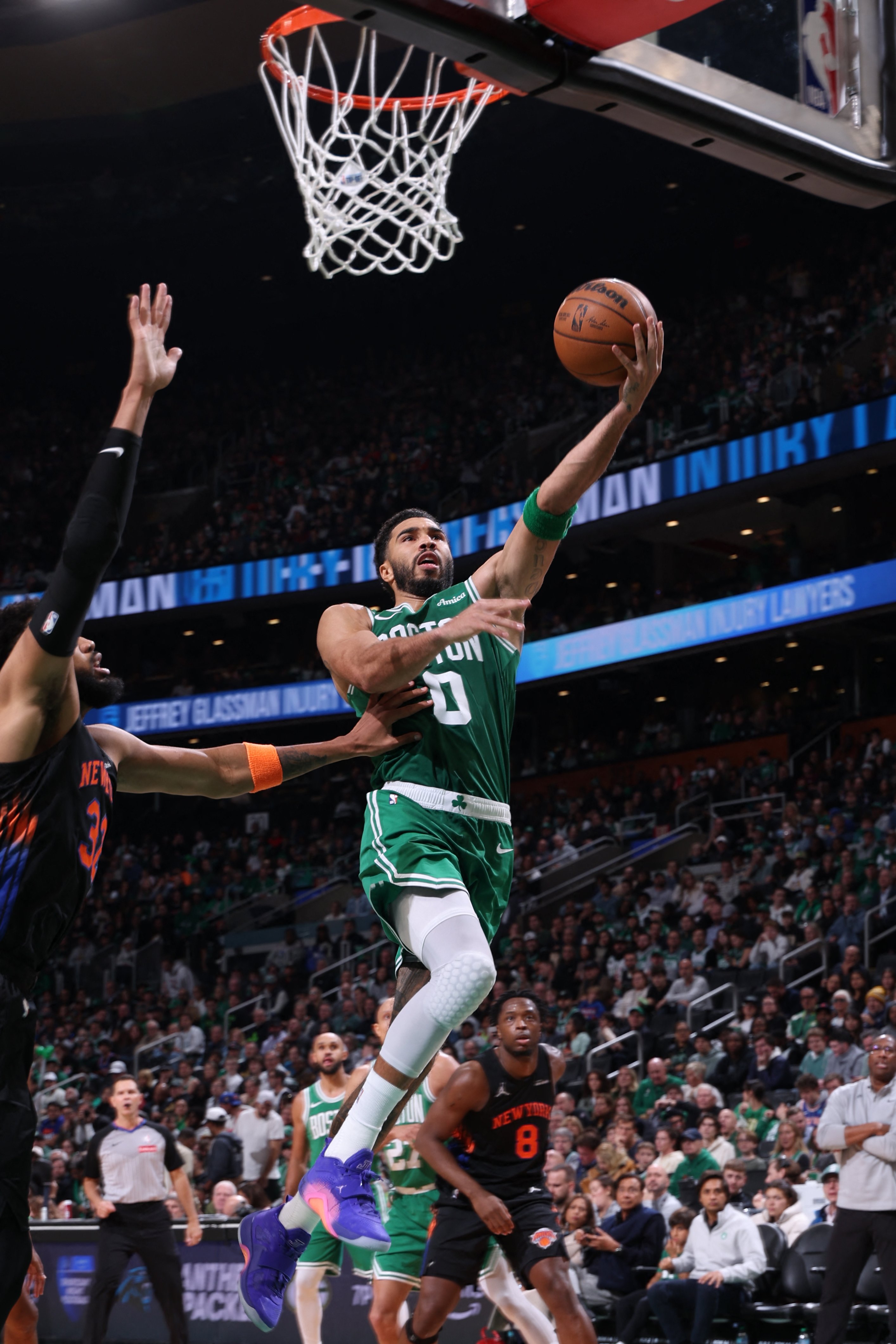 Tatum lifts Celtics past NBA champs