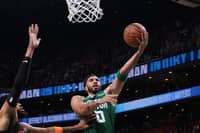 Jayson Tatum drives his way to 36 points in the Boston Celtics’ 107-103 victory over the NBA defending champion New York Knicks.
