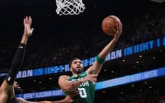 Tatum lifts Celtics past NBA champs