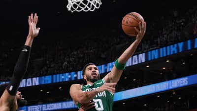 Tatum lifts Celtics past NBA champs