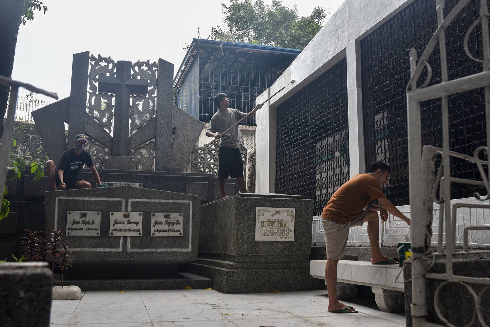 Gravekeepers and caretakers clean and maintain gravestones at the Manila North Cemetery in Manila, on October 24.

The Manila North Cemetery expects around 2 million visitors for this year's Undas. l Zedrich Xylak Madrid