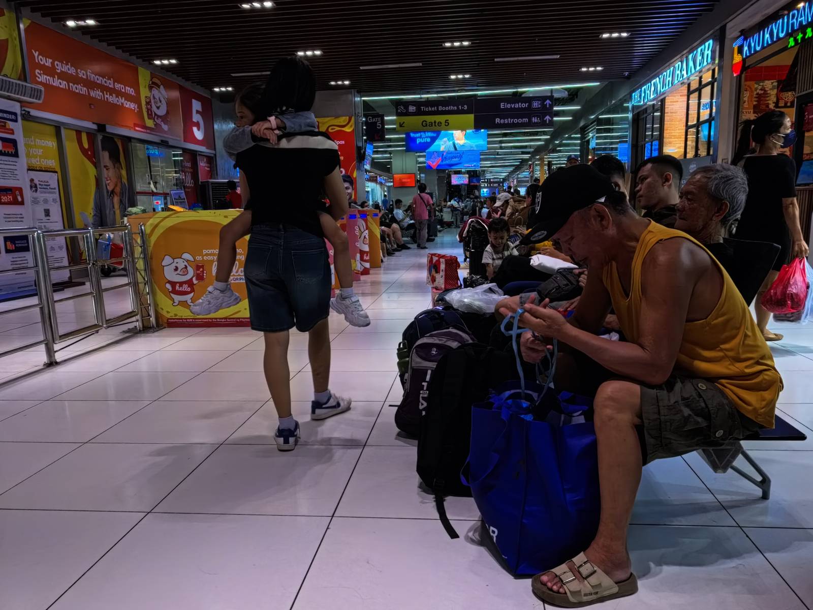 Passengers bound for the provinces flock to the Parañaque Integrated Terminal Exchange (PITX) on 25 October 2026 ahead of the Undas rush, as the Department of Transportation (DOTr) intensifies bus inspections and deploys personnel to ensure safe and orderly travel.