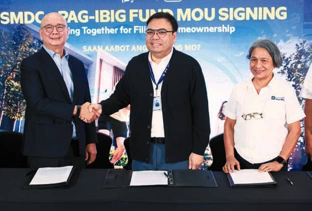 DHSUD, Pag-IBIG Fund, and SM Development Corporation, headed by President Jeffrey Lim, seal their commitment to expanding affordable housing through an MOU signing led by Secretary Aliling and Pag-IBIG Fund CEO Acosta.