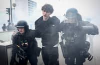 FRENCH Gendarmes detain a protester during a demonstration in favor of purchasing power, the protection of public services, and fiscal and social justice, in Paris on 24 October 2026.