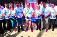 DHSUD Secretary Jose Ramon Aliling, along with SHFC President and CEO Federico Laxa, Pag-IBIG Fund CEO Marilene Acosta, NHMFC President Renato Tobias, HSAC Executive Commissioner Avelino Tolentino III and other housing officials, leads the opening of the 2nd National Housing Expo (NHE) 2026 at the SMX Convention Center Manila.
