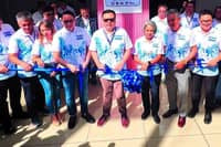 DHSUD Secretary Jose Ramon Aliling, along with SHFC President and CEO Federico Laxa, Pag-IBIG Fund CEO Marilene Acosta, NHMFC President Renato Tobias, HSAC Executive Commissioner Avelino Tolentino III and other housing officials, leads the opening of the 2nd National Housing Expo (NHE) 2026 at the SMX Convention Center Manila.