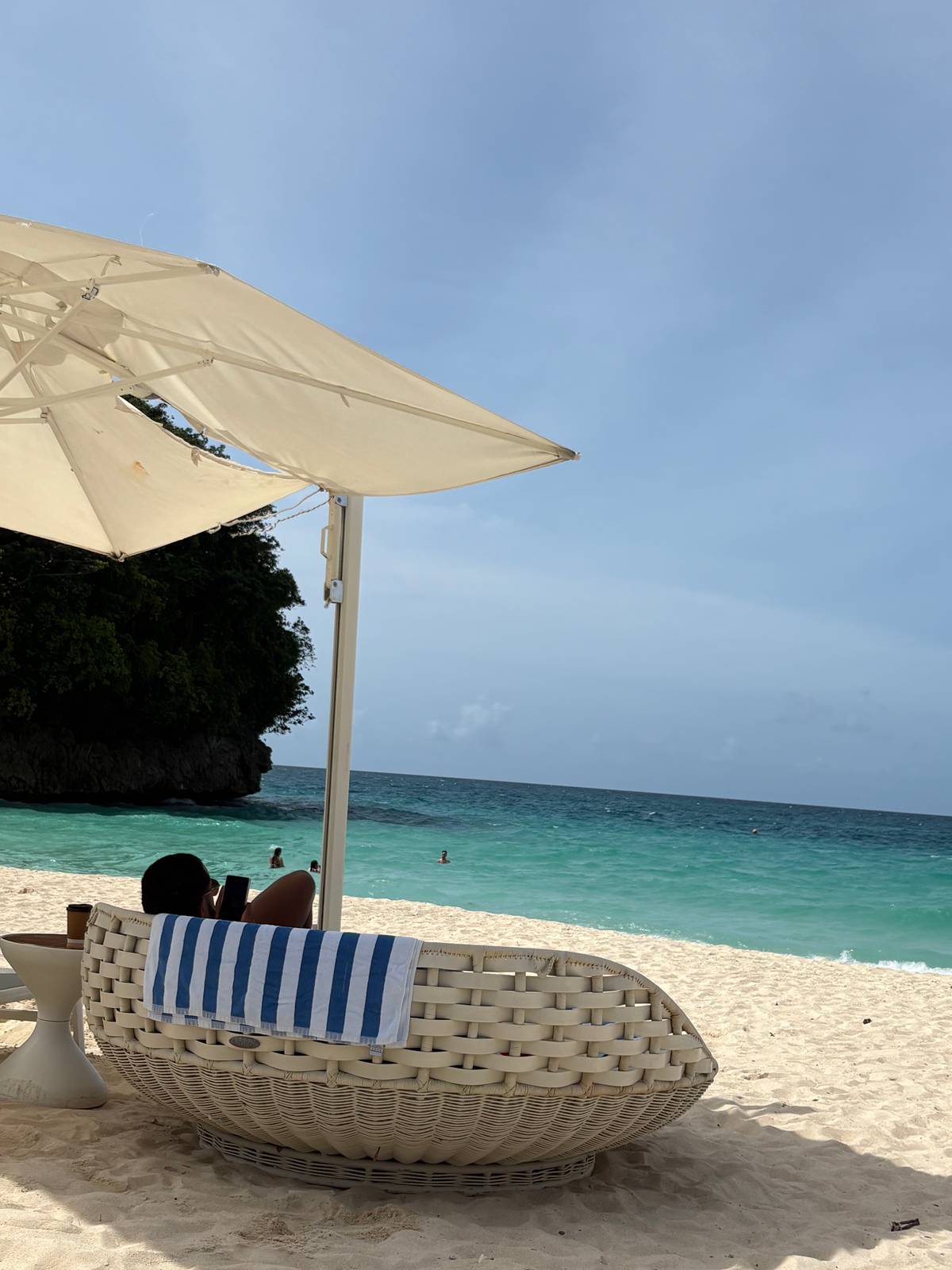 SWEET time by the sea A foreign national enjoys a morning routine with serene views at Azure Beach Club.