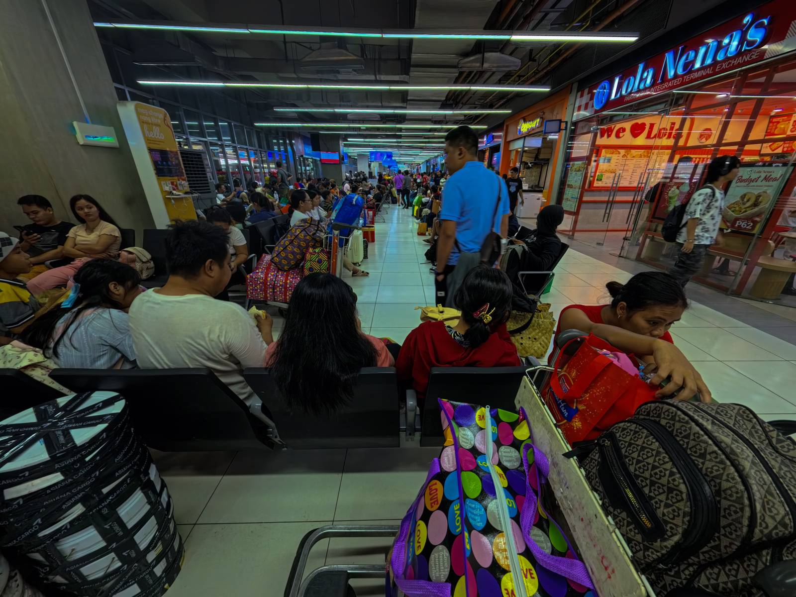 Passengers bound for the provinces flock to the Parañaque Integrated Terminal Exchange (PITX) on 25 October 2026 ahead of the Undas rush, as the Department of Transportation (DOTr) intensifies bus inspections and deploys personnel to ensure safe and orderly travel.