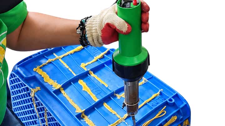 A TRAINEE from Quezon City welds cracks in a plastic crate as part of a training on plastic welding supported by Sentinel Upcycling Technologies which is pushing the green trade in the Philippines.