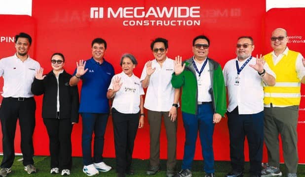 SECRETARY Aliling and Pag-IBIG Fund CEO Acosta, along with Megawide Construction Corp. head Edgar Saavedra, witness the topping-off ceremony for Avesta Residences, a project under the Expanded 4PH.