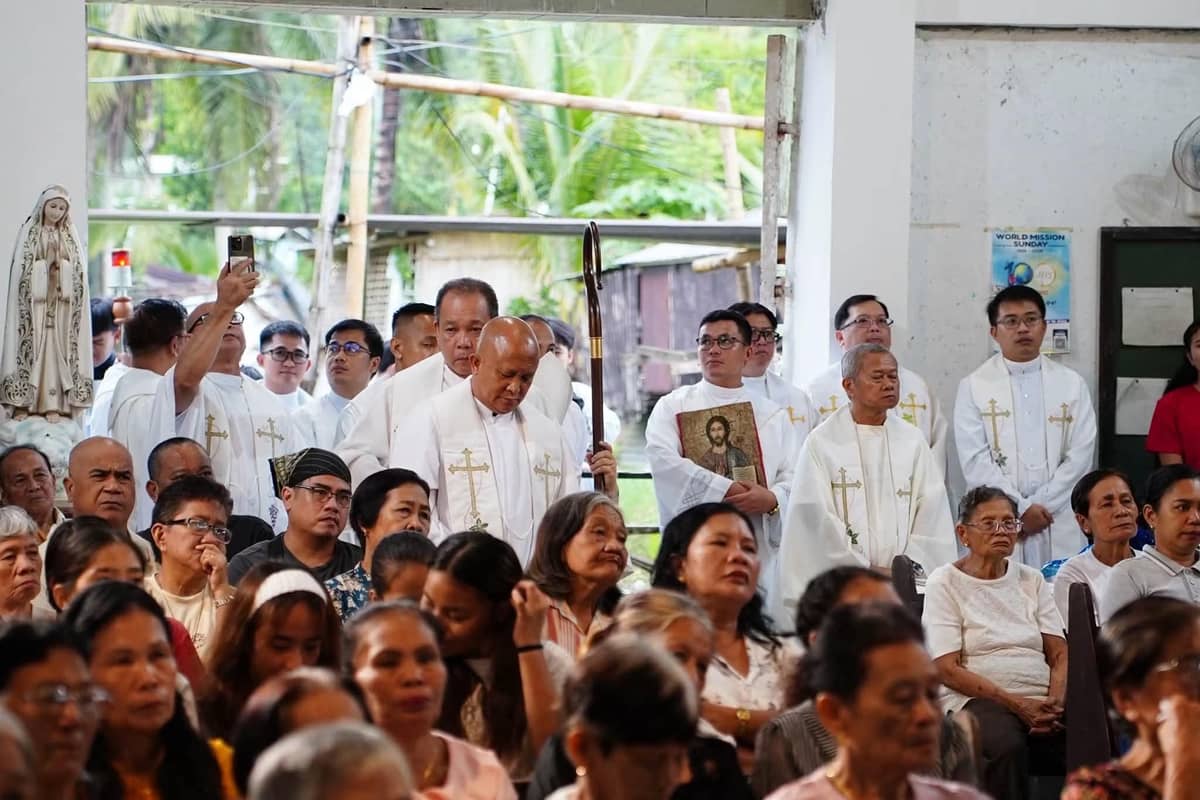 THE faithful and clergy gather for Mass marking the unveiling and blessing of the chapel’s retablo.