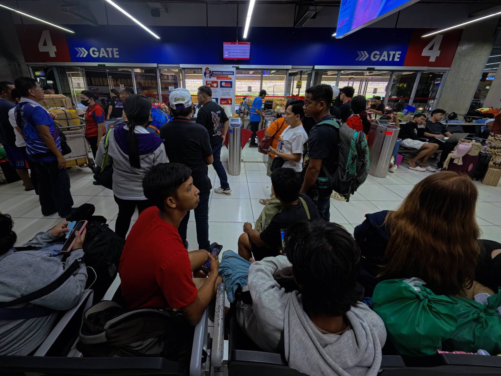 Passengers bound for the provinces flock to the Parañaque Integrated Terminal Exchange (PITX) on 25 October 2026 ahead of the Undas rush, as the Department of Transportation (DOTr) intensifies bus inspections and deploys personnel to ensure safe and orderly travel.