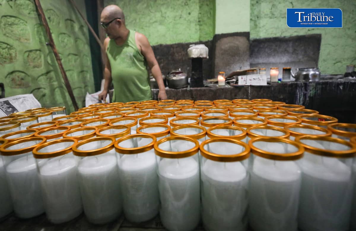 (October 26 2026) Workers at Domrose candle factory in Caloocan City on Monday October 26 2026, get busy produce different kinds and colors of candle, due to the demand surged, ahead of All Saints Day and All Souls Day. Photo/Analy Labor