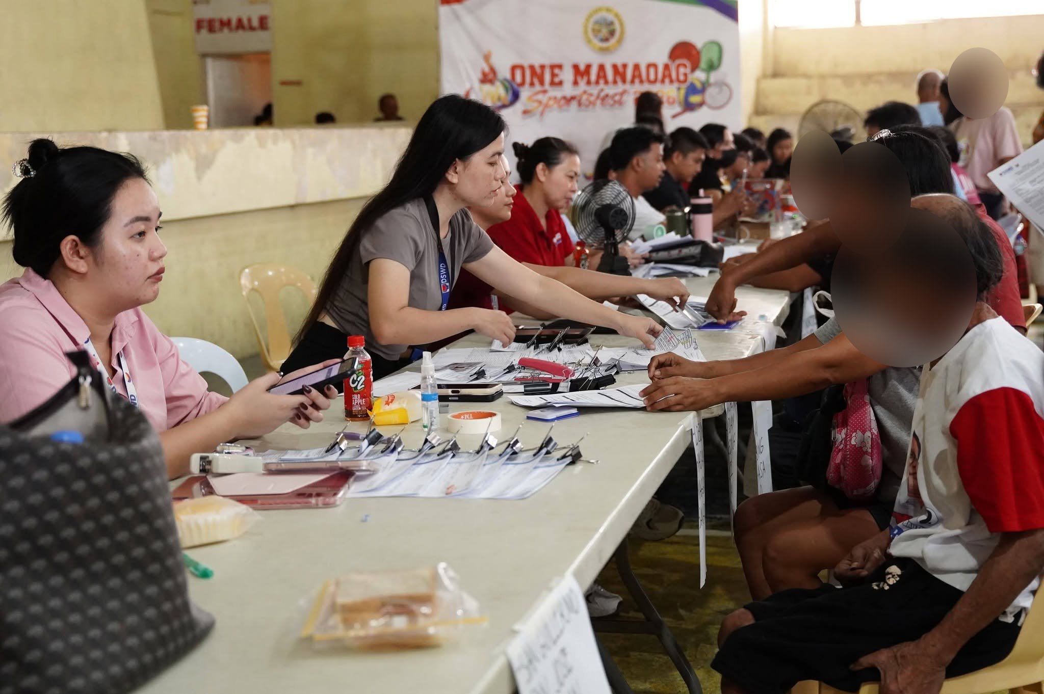 1,000 PWDs in Manaoag, San Jacinto receive P2,000 aid each