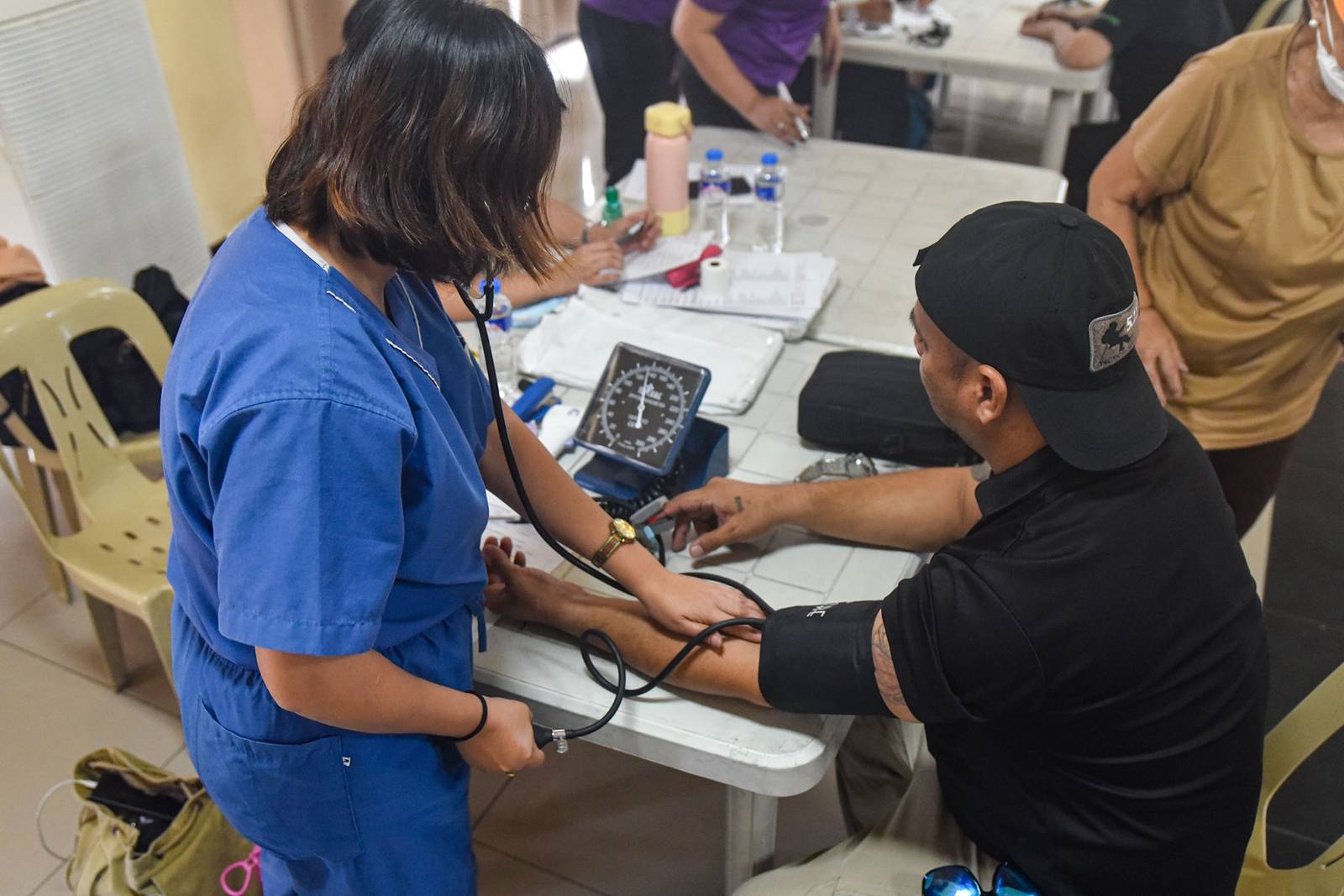Members of the media and their relatives receive medical services during a medical mission organized by the National Press Club of the Philippines (NPC), in partnership with the Department of Health (DOH) and Lifesaver, in Intramuros, Manila, on October 26.

The medical mission coincides with the NPC’s 74th founding anniversary. | Zedrich Xylak Madrid