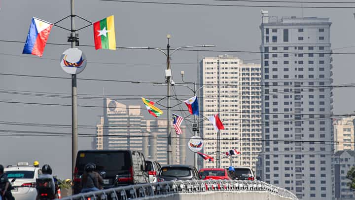 Flags of ASEAN member states are displayed along a flyover leading to Roxas Boulevard in Manila on October 26.
The preparations are for the upcoming ASEAN Summit, which will be held at the Philippine International Convention Center. | Zedrich Xylak Madrid