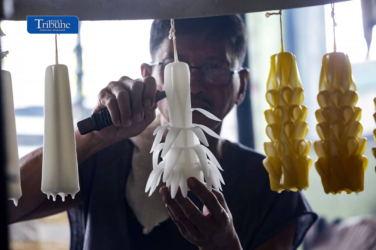 (October 26 2026) Workers at Domrose candle factory in Caloocan City on Monday October 26 2026, get busy produce different kinds and colors of candle, due to the demand surged, ahead of All Saints Day and All Souls Day. Photo/Analy Labor
