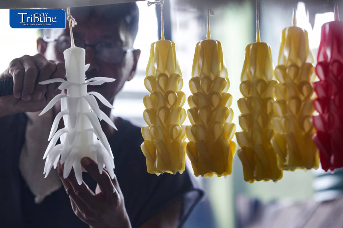 (October 26 2026) Workers at Domrose candle factory in Caloocan City on Monday October 26 2026, get busy produce different kinds and colors of candle, due to the demand surged, ahead of All Saints Day and All Souls Day. Photo/Analy Labor