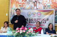 HEALTHCARE EXPANSION. Magdalena Mayor Dario Lapada Jr. discusses plans to improve healthcare facilities and introduce free funeral assistance during a public service event in Magdalena, Laguna, on 26 October 2026. The municipality plans to construct a larger Rural Health Unit and begin offering funeral assistance on 1 November.