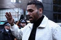 US singer Chris Brown arrives at the Southwark Crown Court in London on 28 January, 2026. Brown avoided jail when sentenced by a UK court on 26 October, 2026 after pleading guilty to a public order offense during a 2023 brawl at a London nightclub.