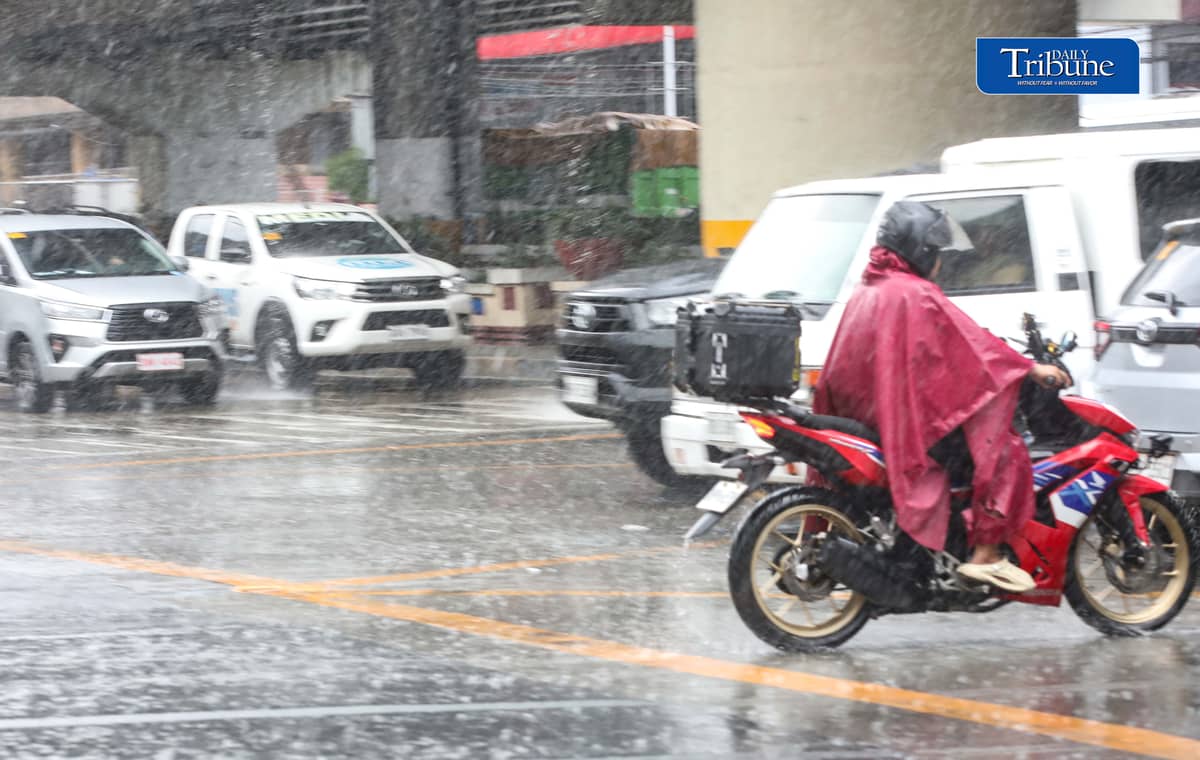 (October 27 2026) Pedestrian and Motorcycle rider use protective gear, due to suddenly heavy downpour happen in Tuesday October 27 2026 in Quezon City. The Philippine Atmospheric, Geophysical and Astronomical Services Administration (PAGASA) weather bureau announced on Tuesday that the northeast monsoon or “amihan” season has officially started, and brings cooler temperatures, stronger winds, and occasional rains. Photo/Analy Labor
