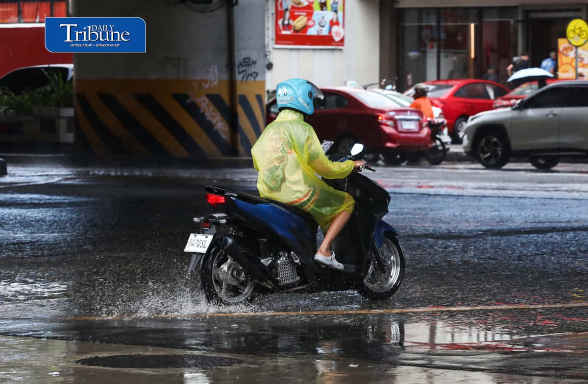 (October 27 2026) Pedestrian and Motorcycle rider use protective gear, due to suddenly heavy downpour happen in Tuesday October 27 2026 in Quezon City. The Philippine Atmospheric, Geophysical and Astronomical Services Administration (PAGASA) weather bureau announced on Tuesday that the northeast monsoon or “amihan” season has officially started, and brings cooler temperatures, stronger winds, and occasional rains. Photo/Analy Labor