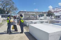 Police conduct information drive in Albay cemetery