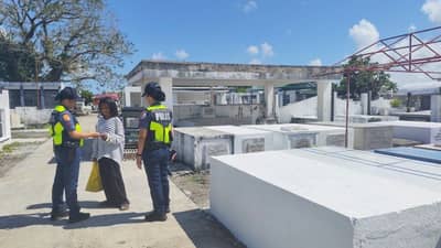 Police conduct information drive in Albay cemetery