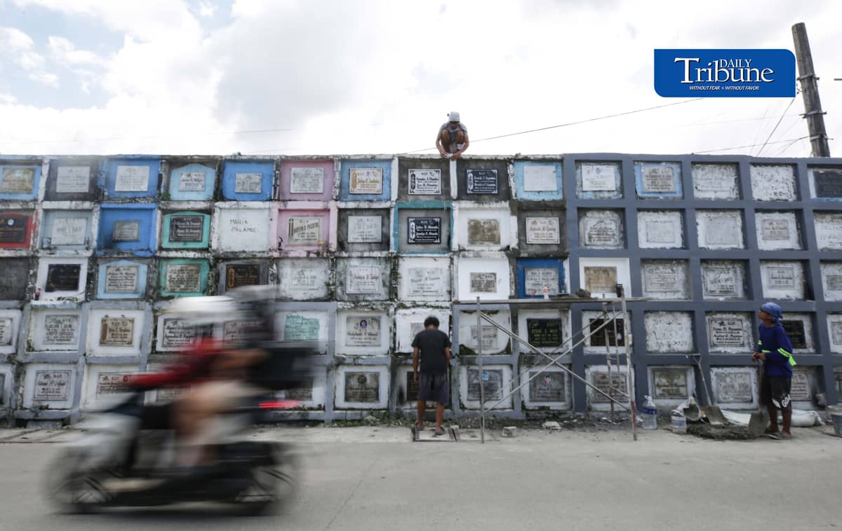 (October 27 2026)  Individuals began to visit and clean the tombs or their departed loved ones to avoid crowded during the  All Saints’ Day and All Souls’ Day celebration at Karuhatan Public Cemetery in Valenzuela City on Tuesday, October 27, 2026. Photo/Analy Labor