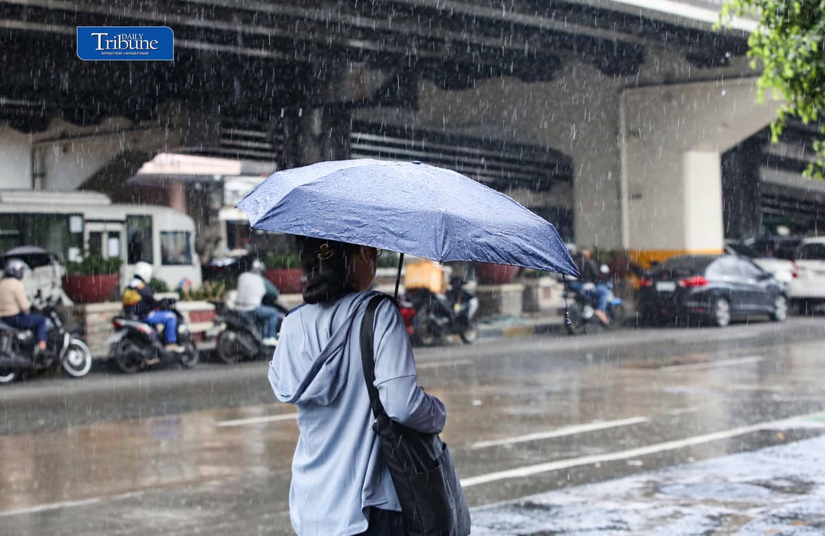 (October 27 2026) Pedestrian and Motorcycle rider use protective gear, due to suddenly heavy downpour happen in Tuesday October 27 2026 in Quezon City. The Philippine Atmospheric, Geophysical and Astronomical Services Administration (PAGASA) weather bureau announced on Tuesday that the northeast monsoon or “amihan” season has officially started, and brings cooler temperatures, stronger winds, and occasional rains. Photo/Analy Labor
