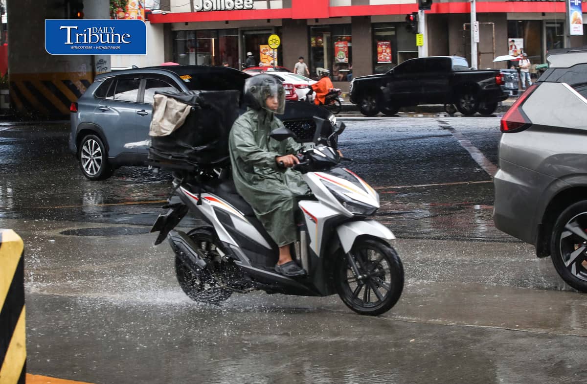 (October 27 2026) Pedestrian and Motorcycle rider use protective gear, due to suddenly heavy downpour happen in Tuesday October 27 2026 in Quezon City. The Philippine Atmospheric, Geophysical and Astronomical Services Administration (PAGASA) weather bureau announced on Tuesday that the northeast monsoon or “amihan” season has officially started, and brings cooler temperatures, stronger winds, and occasional rains. Photo/Analy Labor