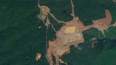 A Google Earth satellite image showing a mining site in Dinapigue, Isabela.
