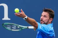 Switzerland's Stan Wawrinka serves to Italy's Matteo Berrettini in their men's singles first round tennis match on day two of the US Open tennis tournament at the USTA Billie Jean King National Tennis Center in New York City on August 31, 2026.