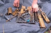 ARMY troops recovered two M16 rifles and an anti-personnel mine from a concealed arms cache in Barangay Osmeña, Las Navas, Northern Samar, on 26 October.