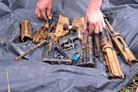 Troops recover M16 rifles, land mine