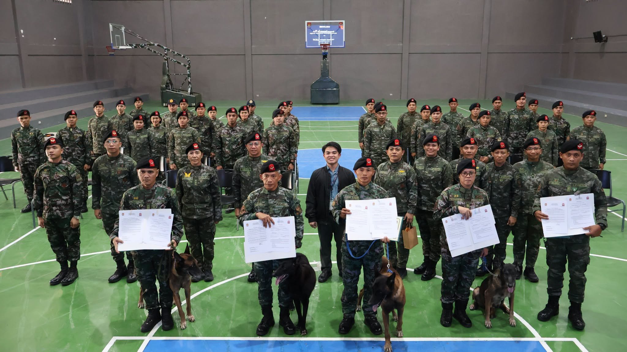 PNP SAF turns over five retired explosive detection dogs to new handlers