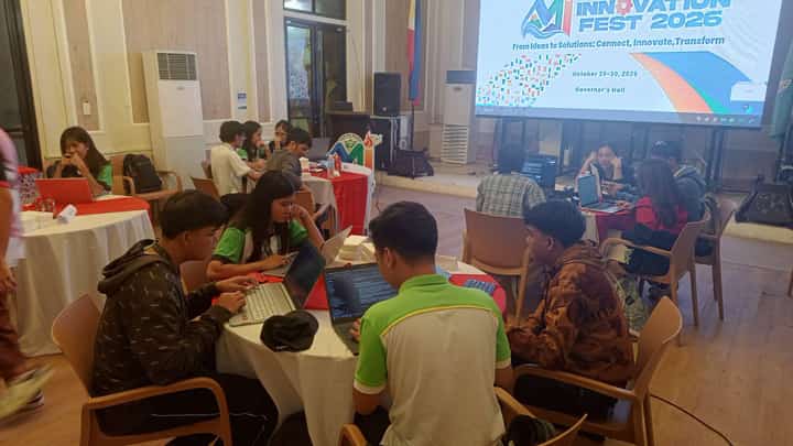 Participants work on their entries during the Marinduque Innovation Fest 2026 hackathon at the Governor’s Hall of the Provincial Capitol in Boac, Marinduque, on 29 October. Five finalist teams are competing to develop digital solutions to community challenges.